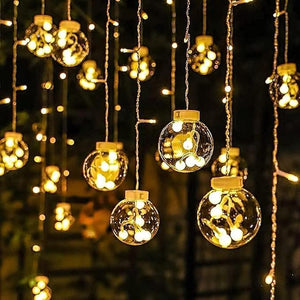 
                  
                    Lexton12 Wishing Ball LED Curtain String Lights with 8 Flashing Modes Lights for Home Decoration Wedding, Diwali, Party,Home Decor, Balcony Decoration (96 Led, Warm White)
                  
                