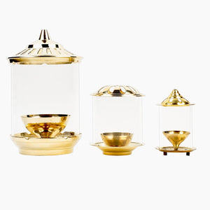 
                  
                    Klassic Medium Akhand Diya with Borosilicate Glass Shade | High-Quality Brass | Oil Lamp | Diya for Pooja, Home Decoration, Gold Lid for Jyoti Lighting in Bedroom, Mandir(5 Inches, Cylindrical)
                  
                