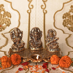 
                  
                    Klassic Laxmi Ganesh Saraswati Idol with Good Design Diya Lamp | Diwali Diya, Durga Puja Gift Temple Articles Decoration Antique Gifts (Pack of 1, Golden)
                  
                