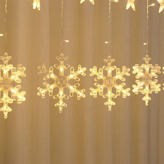 
                  
                    Lexton Snowflake Curtain String Light with Star | 138 Led Curtain Light | Warm White | 6 Snowflakes & 6 Stars | for Indoor Decorations, Christmas, Wedding, Party, Birthday
                  
                