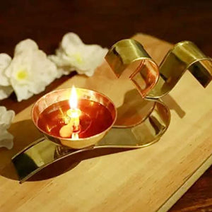 
                  
                    Klassic Decorative Brass Om Shape Oil Diya with Handle for Home, Temple, Office, Gifting & Decor for Pooja Room(6 Inch X 3 Inch), Gold, Medium
                  
                