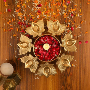 
                  
                    Klassic Unique and Antique 7 Lotus Diya Shape Urli Bowl | Metal, Perfect for Home Decor and a Unique Gift for Diwali, Housewarming, and Festive Celebrations (Golden, Pack of 1)
                  
                
