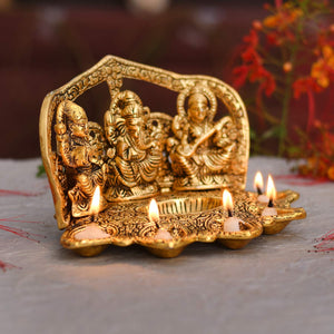 
                  
                    Klassic Laxmi Ganesh Saraswati Idol 5 Face Diya Oil Lamp Deepak Metal Showpiece Statue Traditional Diya for Diwali Puja , Home Decoration ( Pack of 1 , Gold )
                  
                