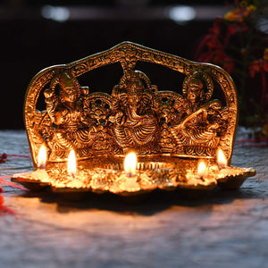 
                  
                    Klassic Laxmi Ganesh Saraswati Idol 5 Face Diya Oil Lamp Deepak Metal Showpiece Statue Traditional Diya for Diwali Puja , Home Decoration ( Pack of 1 , Gold )
                  
                