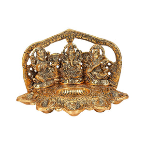 
                  
                    Klassic Laxmi Ganesh Saraswati Idol 5 Face Diya Oil Lamp Deepak Metal Showpiece Statue Traditional Diya for Diwali Puja , Home Decoration ( Pack of 1 , Gold )
                  
                