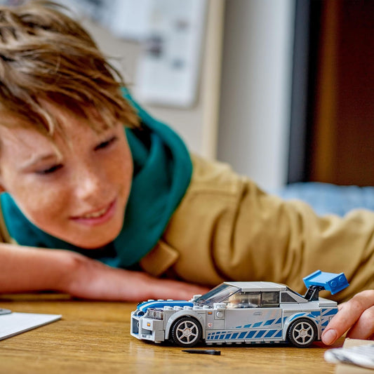 LEGO Speed Champions Nissan Skyline GT-R R34 76917 Race Car Set for Kids 9+ (Box Condition Damaged, Product Fine)