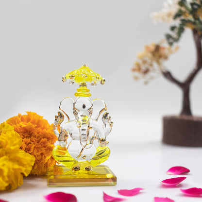 iCraft God Ganesh Sitting with Chakra Statue (Murti) Idol Showpiece Handmade of Crystal Glass by for Worship, Decoration, Car Dashboard, Gift (Yellow), Small