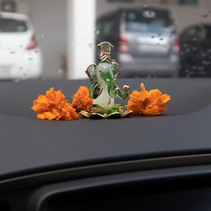 
                  
                    iCraft God Ganesh Sitting on Petal Statue (Murti) Idol Showpiece Handmade of Crystal Glass by for Worship, Decoration, Car Dashboard, Gift (Green)
                  
                