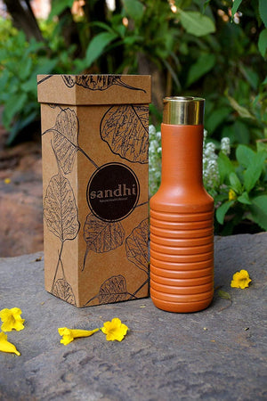 
                  
                    Sandhi Terracotta Bottle with copper rod 
                  
                